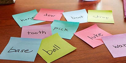 Write a word on a Post-it® Super Sticky Note that can be combined with another word