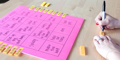 Write your kids' names on the Post-it® Page Markers, and stick them to the edges of the poster