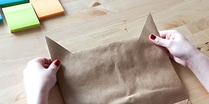 If your grocery bag has handles, cut them off